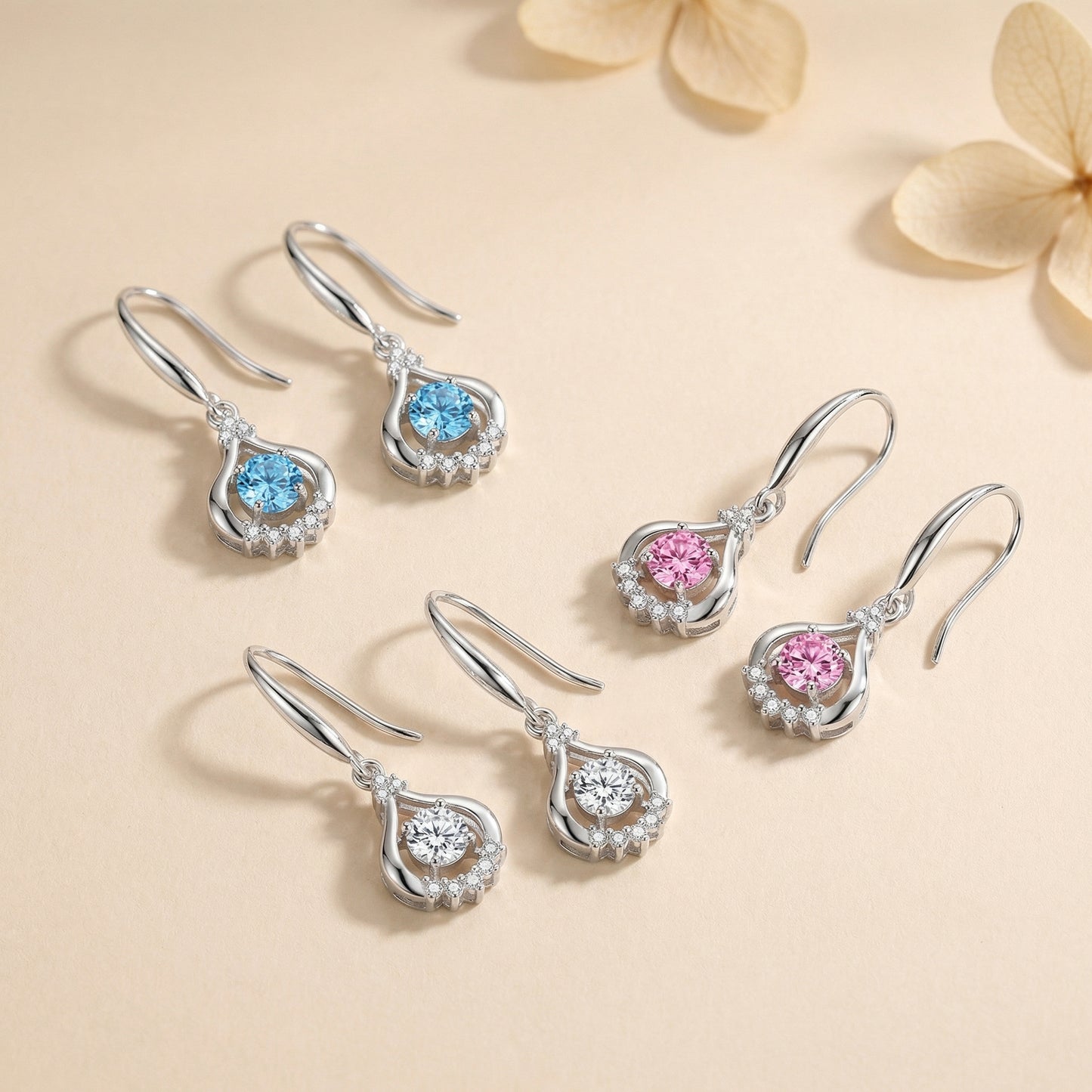 925 sterling silver teardrop dancing cubic zirconia earrings in blue, pink and clear colours
