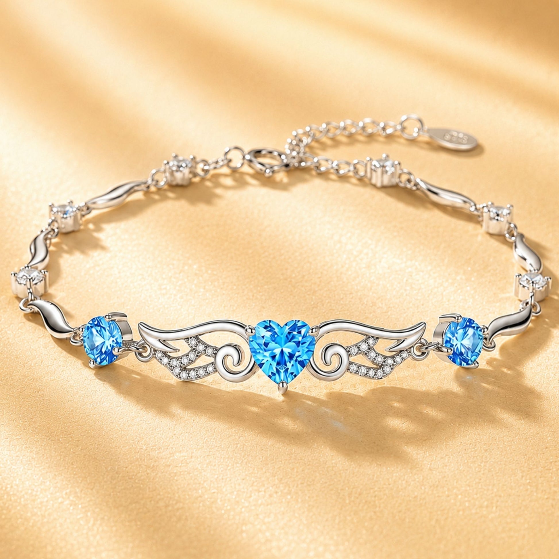 Blue cubic zirconia angel wings heart bracelet in 925 sterling silver main