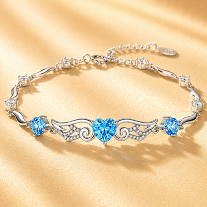 Blue cubic zirconia angel wings heart bracelet in 925 sterling silver main
