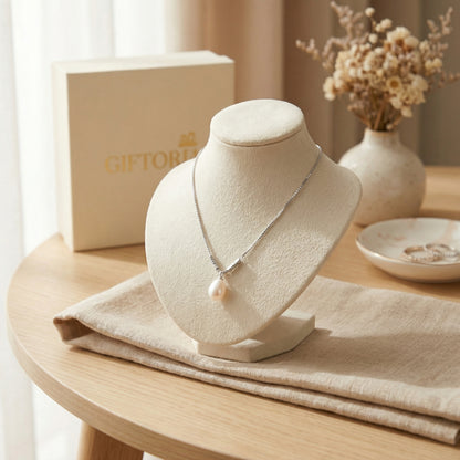 925 sterling silver teardrop pearl pendant necklace displayed on jewellery stand with gift box