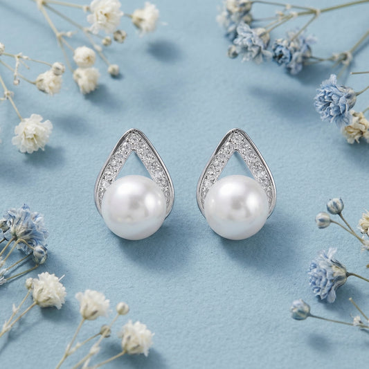 925 sterling silver pearl teardrop stud earrings with elegant white pearls front view