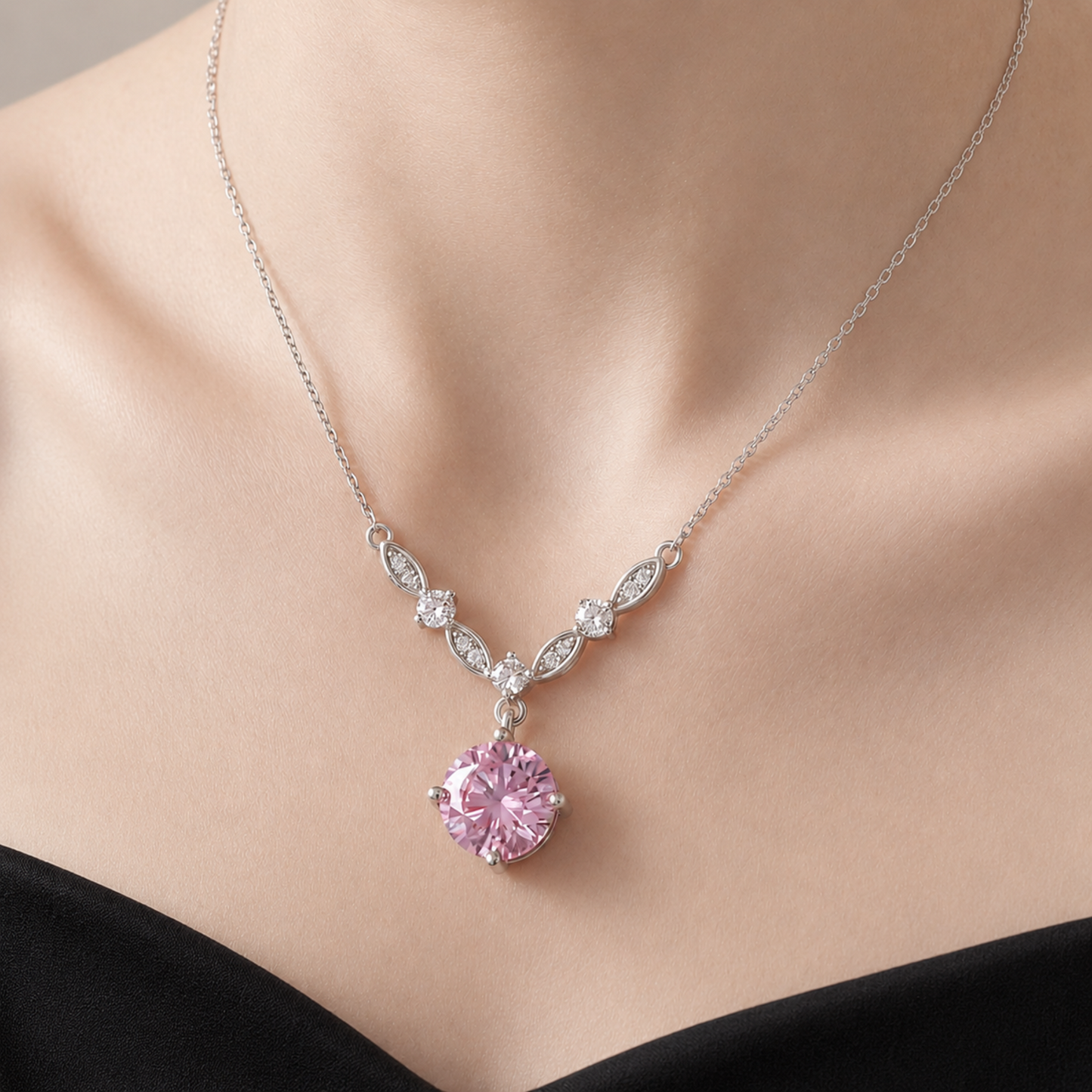 Pink cubic zirconia floral vine necklace styled on model with elegant black outfit