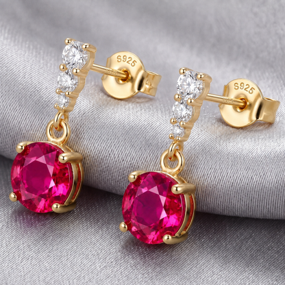 Back view of ruby red drop earrings with 925 sterling silver posts and butterfly backs