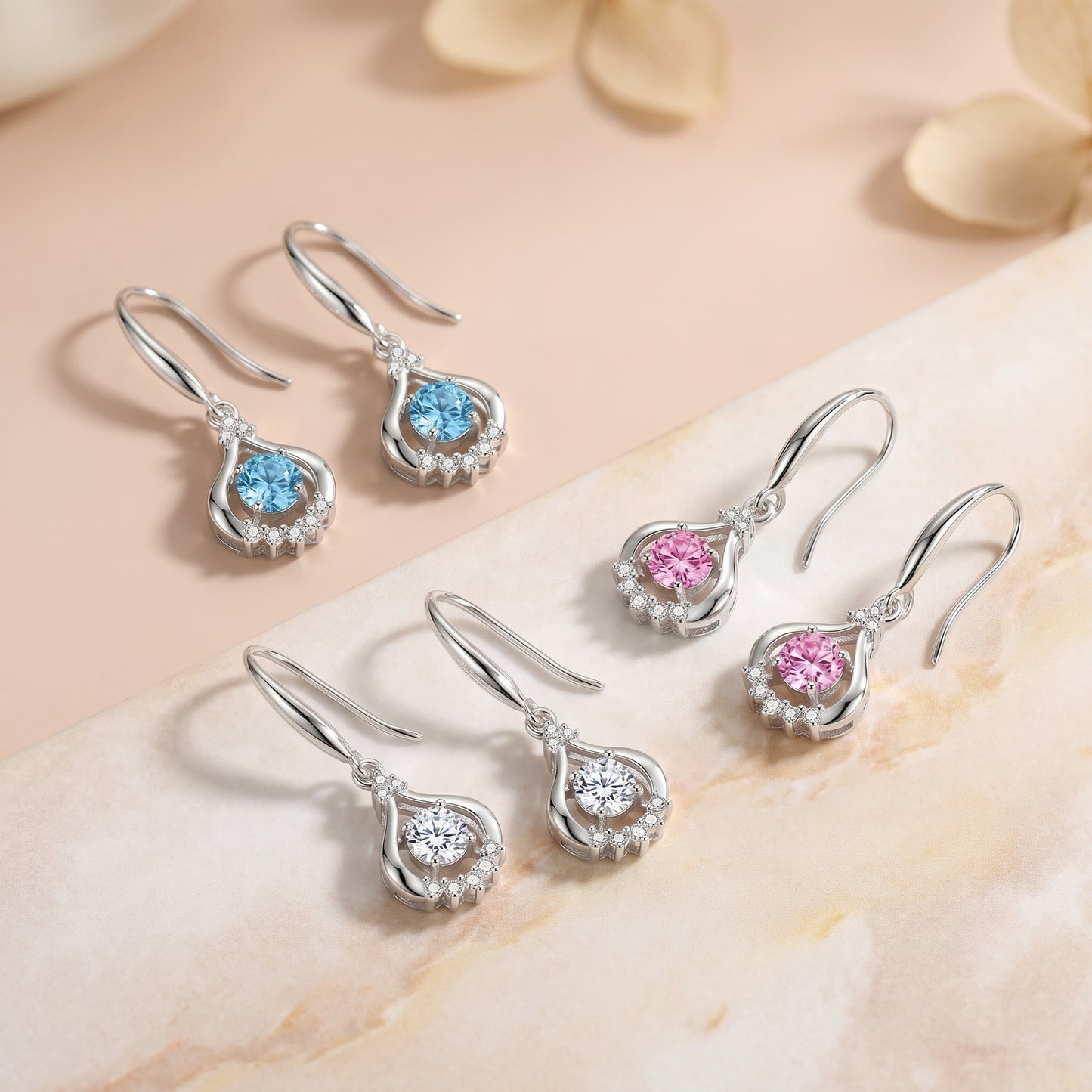 925 sterling silver teardrop dancing cubic zirconia earrings in blue, pink and clear colours lifestyle