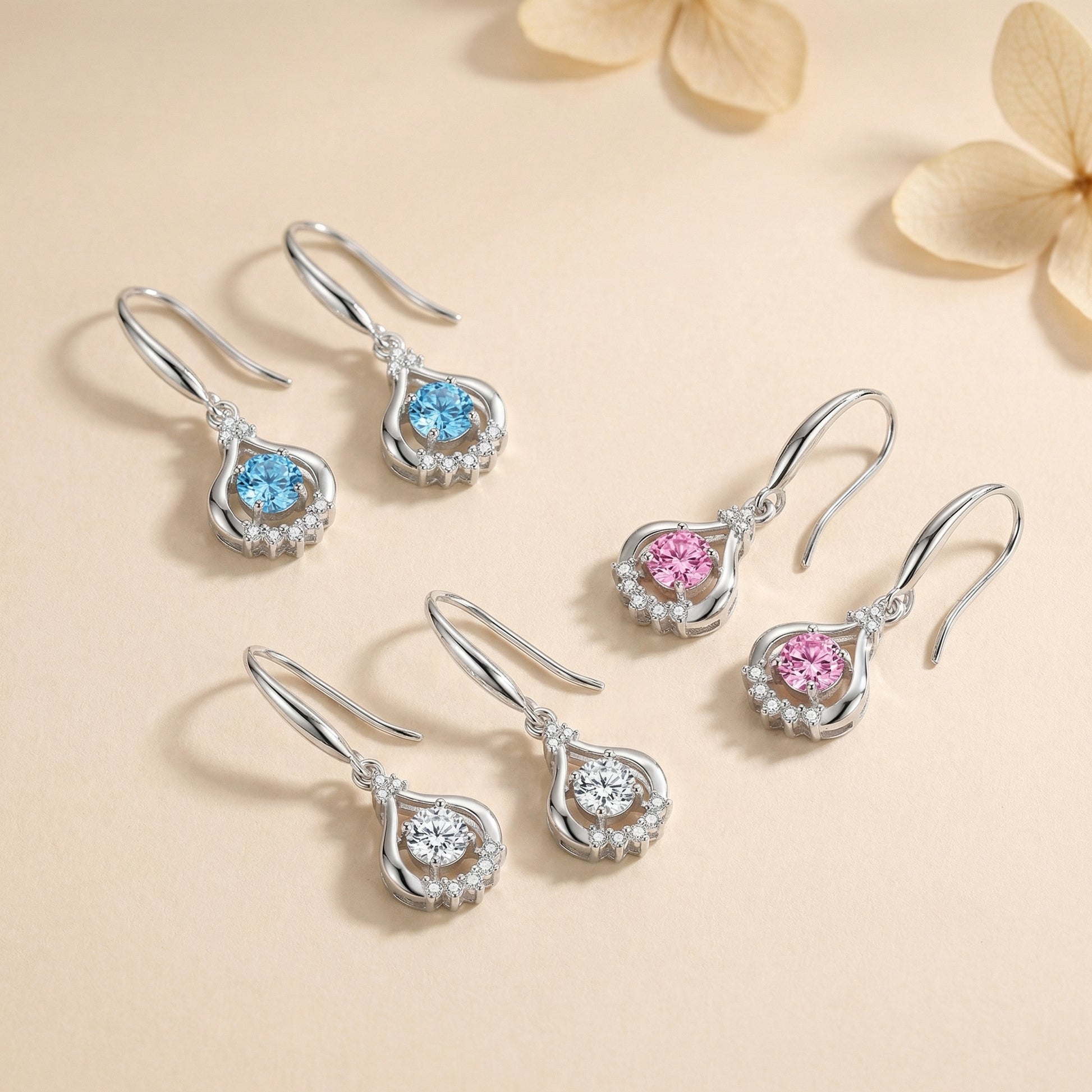 925 sterling silver teardrop dancing cubic zirconia earrings in blue, pink and clear colours