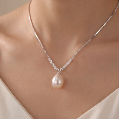 Model wearing photo of 925 sterling silver teardrop pearl pendant necklace