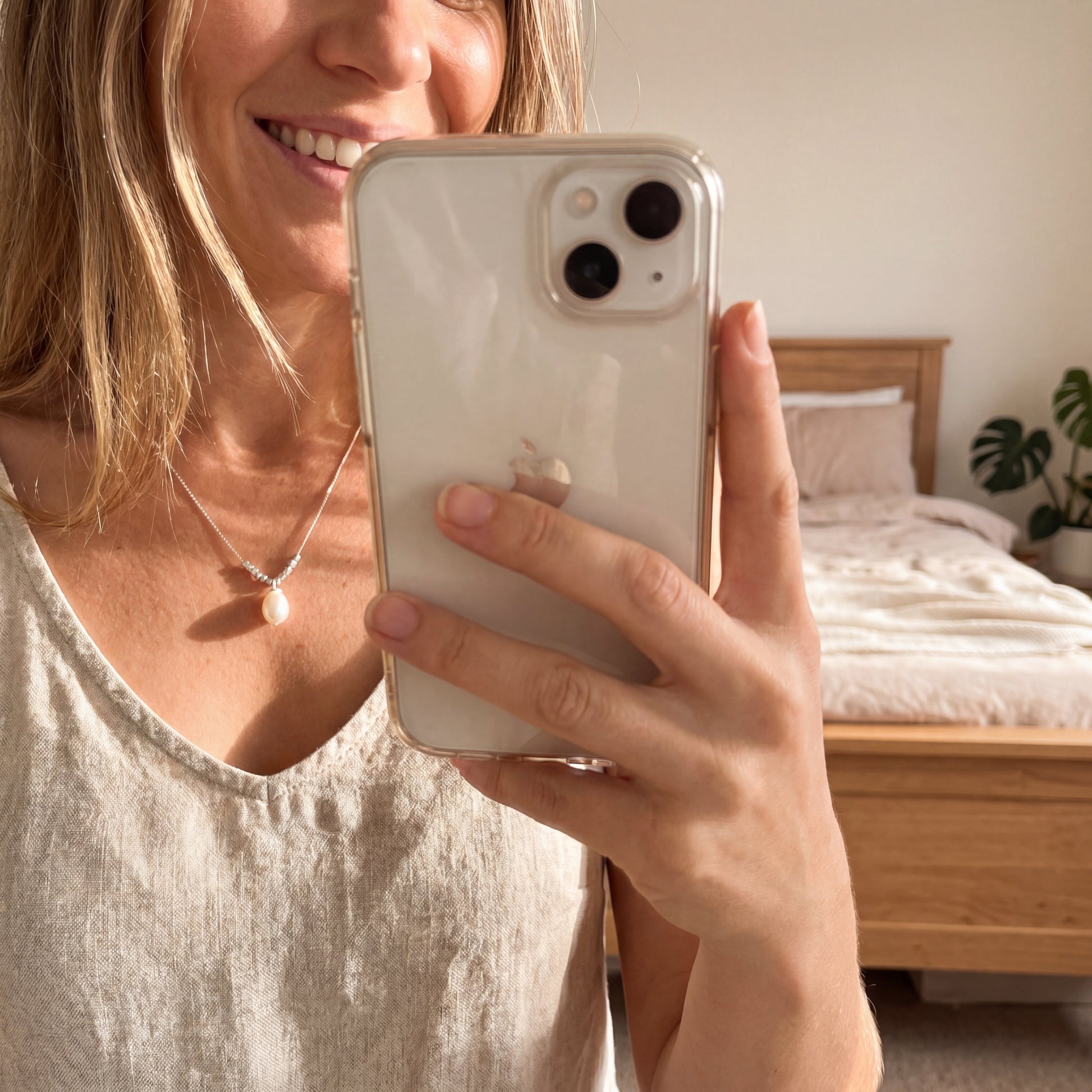 Real-life wearing photo of 925 sterling silver teardrop pearl pendant necklace