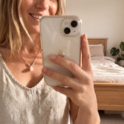 Real-life wearing photo of 925 sterling silver teardrop pearl pendant necklace