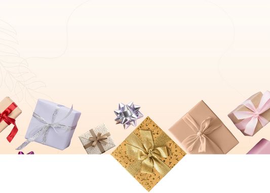 Various gift boxes with ribbons on a light beige background