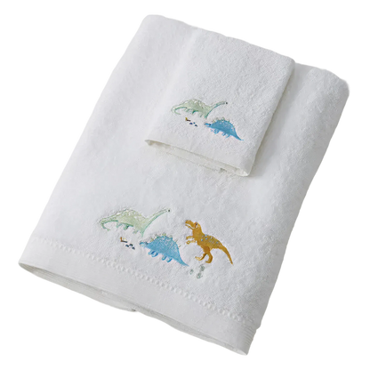 White towels with embroidered dinosaur designs