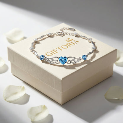 Angel Wings 925 sterling silver heart bracelet presented in Giftoria gift box ready for gifting