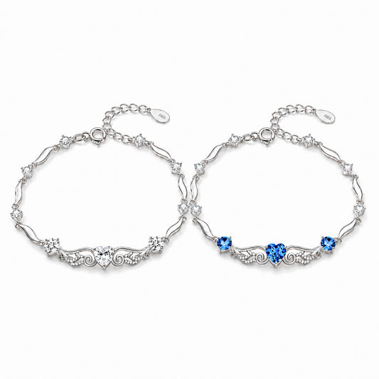 Angel Wings 925 sterling silver heart bracelet in blue and clear crystal styles displayed together