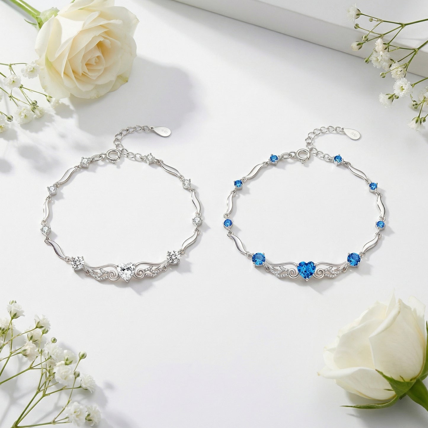 Angel Wings 925 sterling silver heart bracelet in two colour options blue and clear