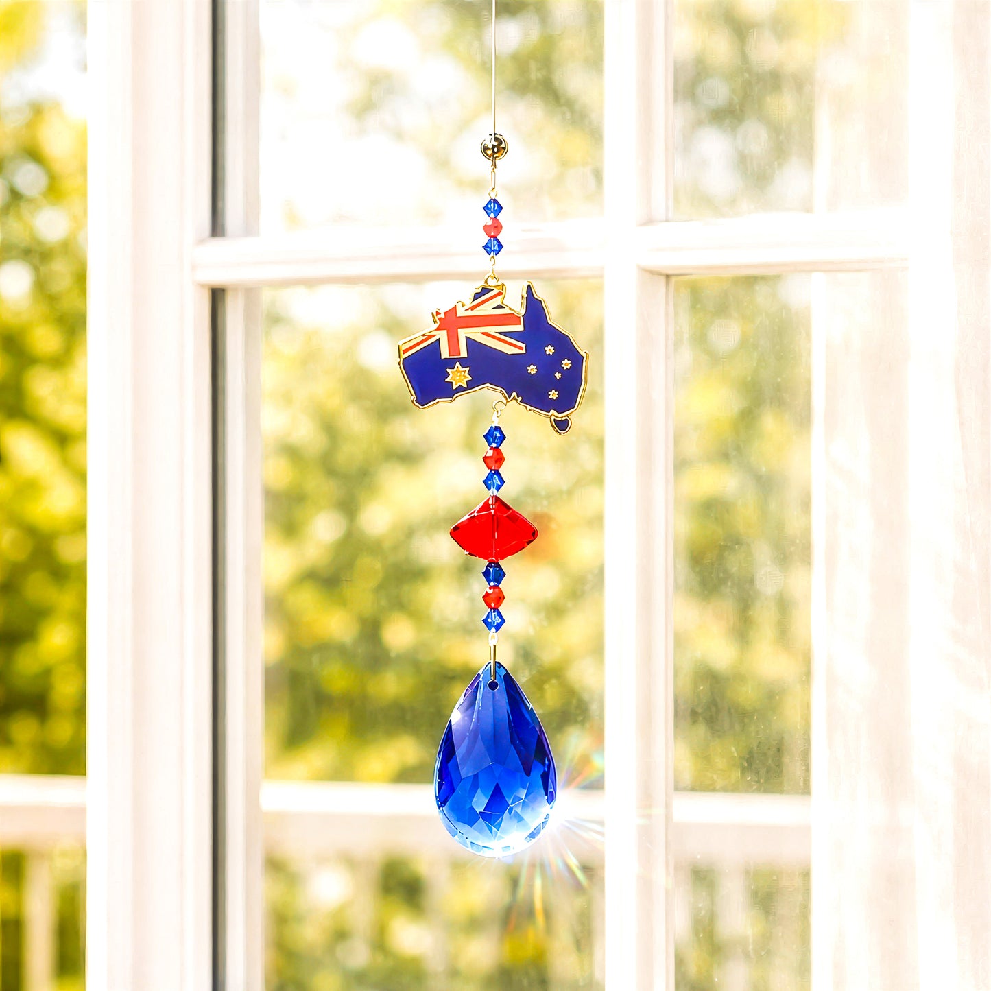 Australia crystal sun catcher gift hanging on window, reflecting colourful light in home