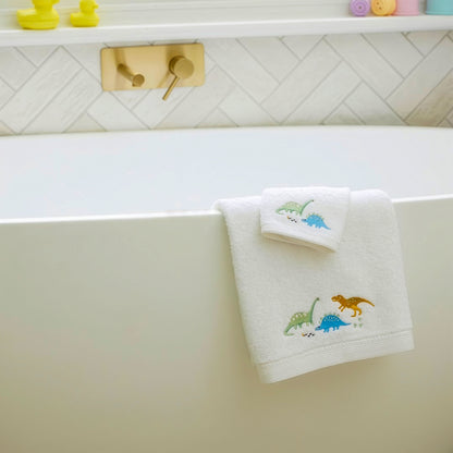 Dinosaur baby bath towel set displayed in modern bathroom