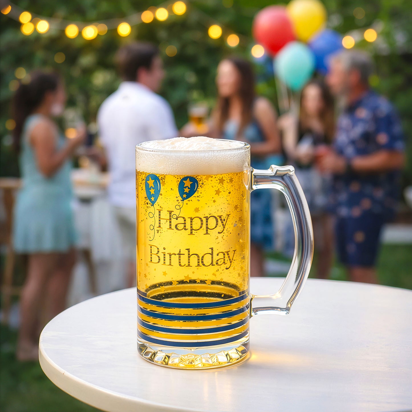Birthday party scene with a beer tankard gift for him on outdoor table