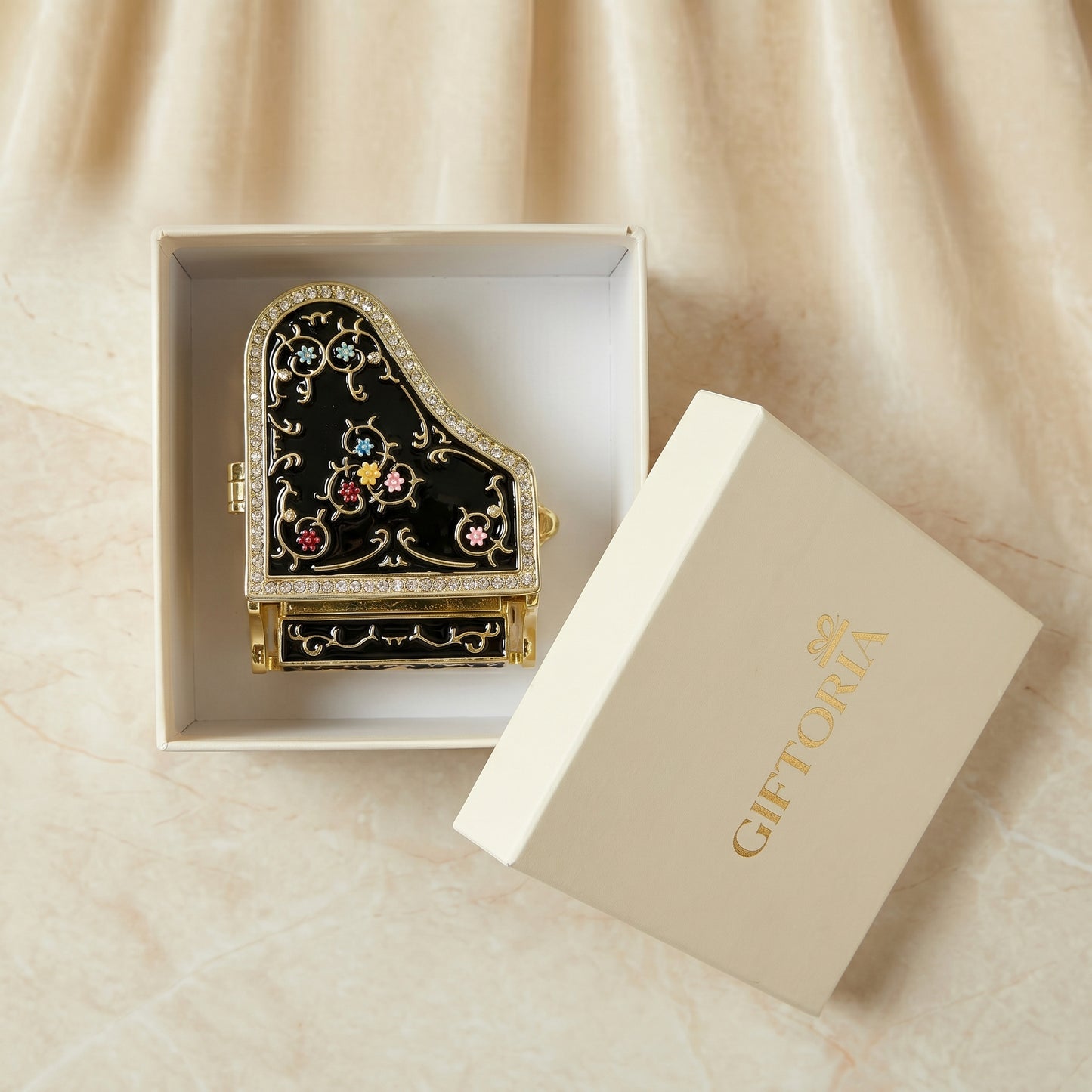 Black piano jewellery box presented in a Giftoria gift box, ready to gift for birthdays, anniversaries and music lovers.