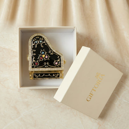 Black piano jewellery box presented in a Giftoria gift box, ready to gift for birthdays, anniversaries and music lovers.