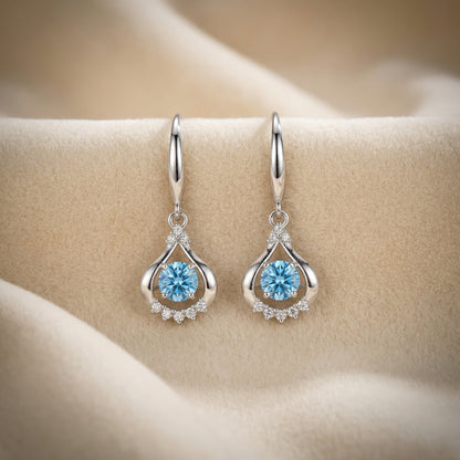 Blue 925 sterling silver teardrop cubic zirconia earrings with dancing crystal detail