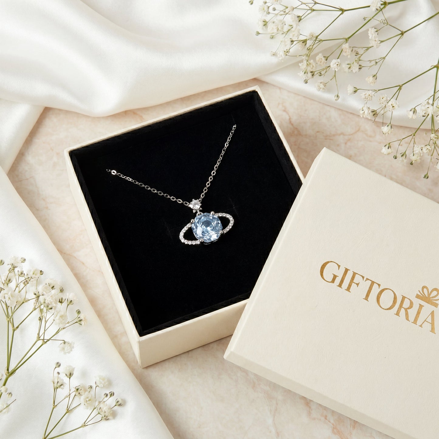 Blue planet sparkling star necklace presented in Giftoria gift box ready for gifting