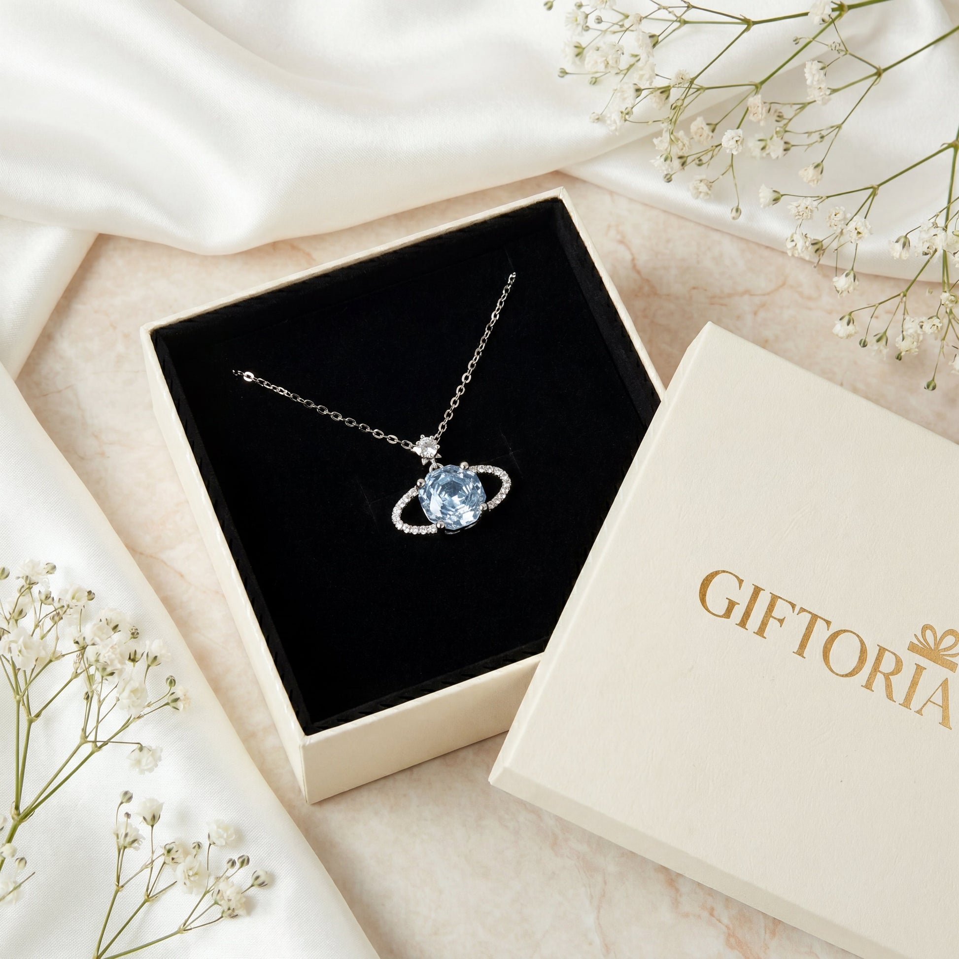 Blue planet sparkling star necklace presented in Giftoria gift box ready for gifting