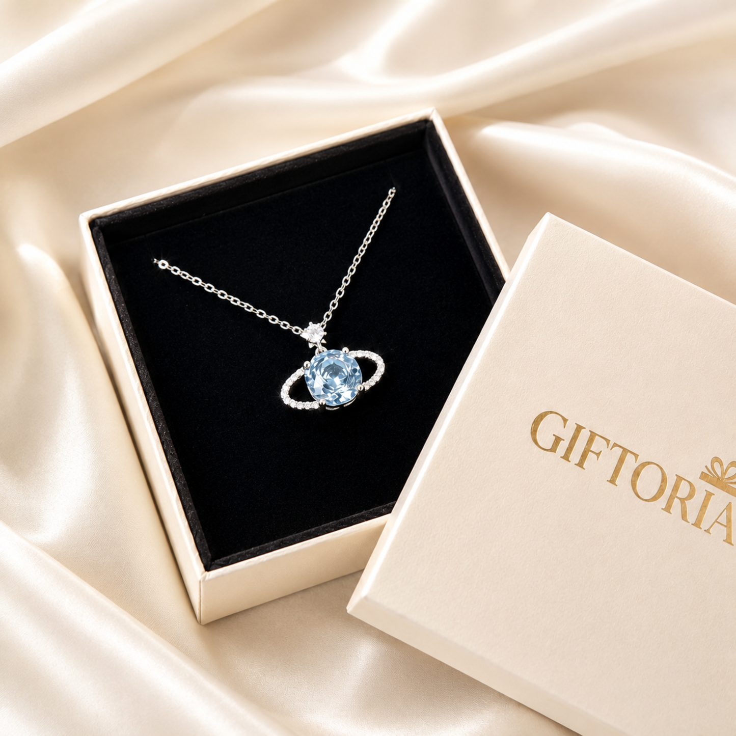 Blue Planet sparkling star necklace presented in a Giftoria jewellery gift box