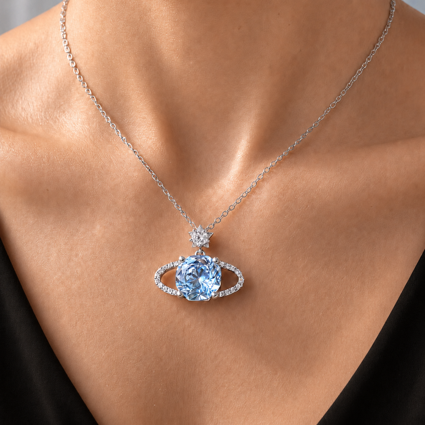 Woman wearing the Blue Planet sparkling star necklace in 925 sterling silver