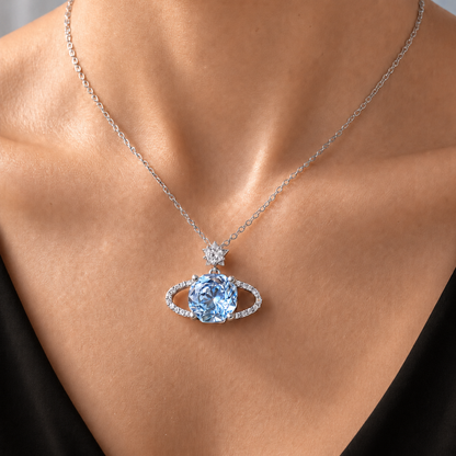 Woman wearing the Blue Planet sparkling star necklace in 925 sterling silver