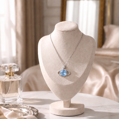 Blue Planet sparkling star pendant necklace displayed on a jewellery bust