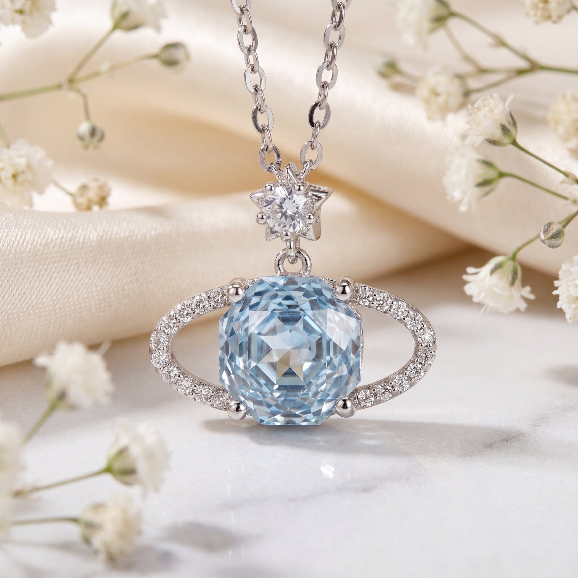 Close up of blue planet star cubic zirconia necklace with sparkling celestial pendant design