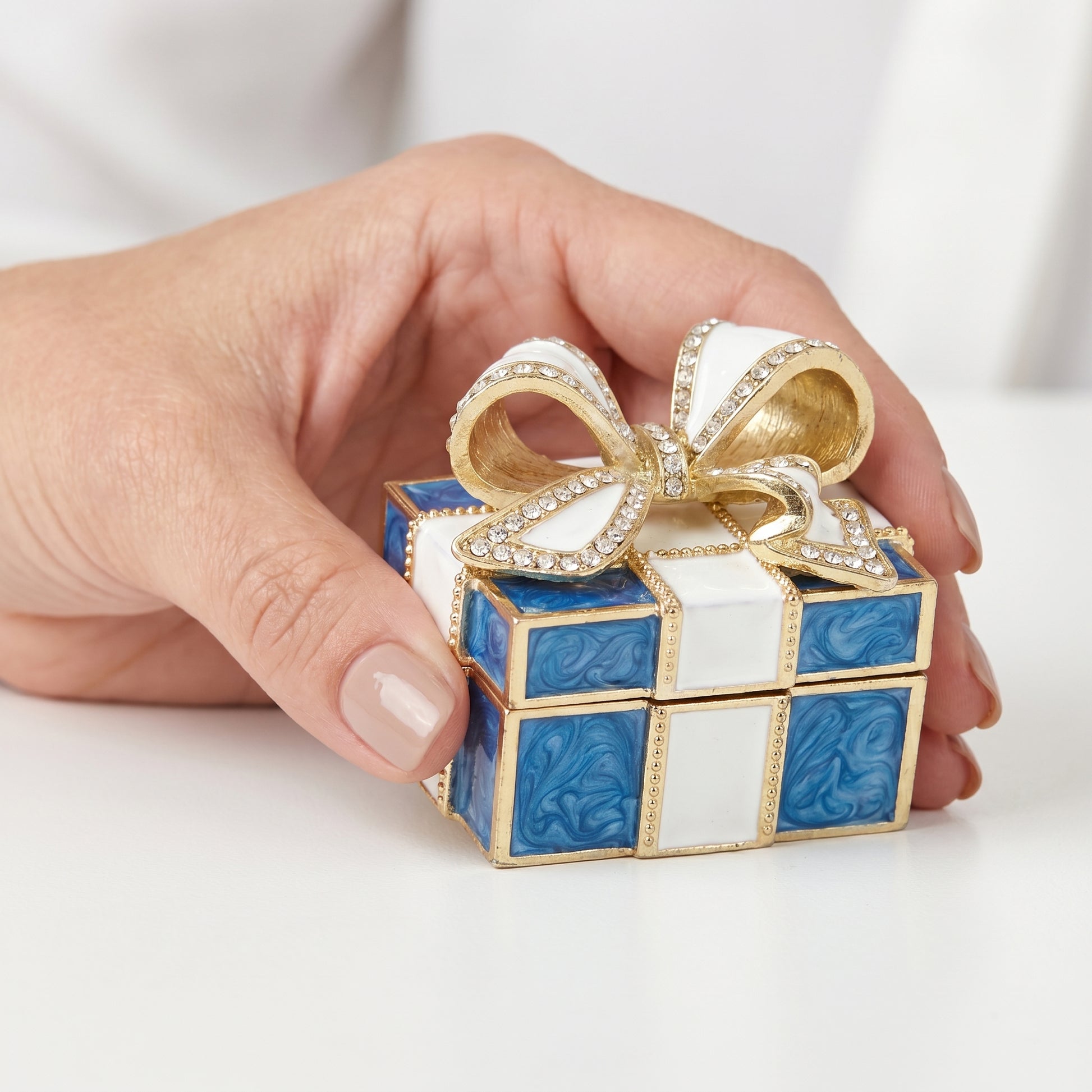 Blue vintage bow gift box enamel crystal jewellery box held in hand, elegant ring holder and gift-ready jewellery storage for her