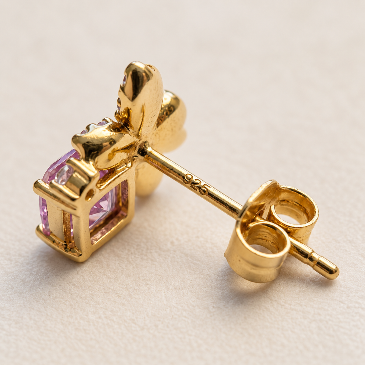 Side and back view of the Gold Butterfly Garden stud earrings showing the post fastening