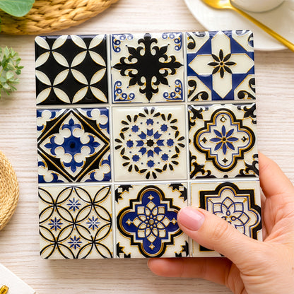 Blue patterned ceramic drink coasters square design close up detail