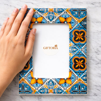 Close up of patterned ceramic photo frame detail