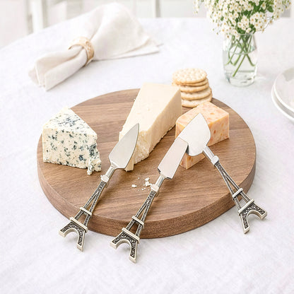 Cheese knife set 3pcs displayed with assorted cheeses on wooden board