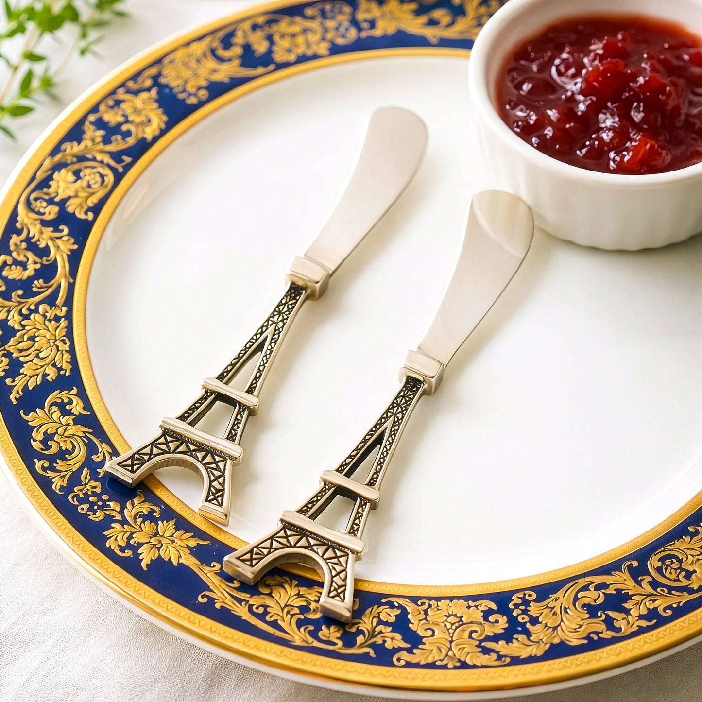 Elegant cheese spreader set on decorative dining plate