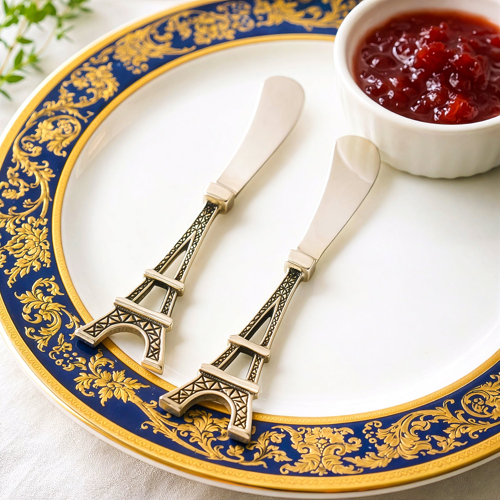 Elegant cheese spreader set on decorative dining plate