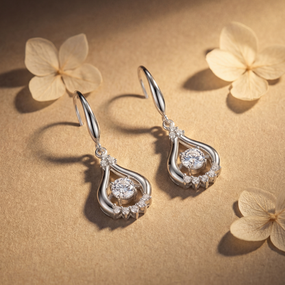 Clear sterling silver teardrop dancing crystal earrings with elegant cubic zirconia sparkle