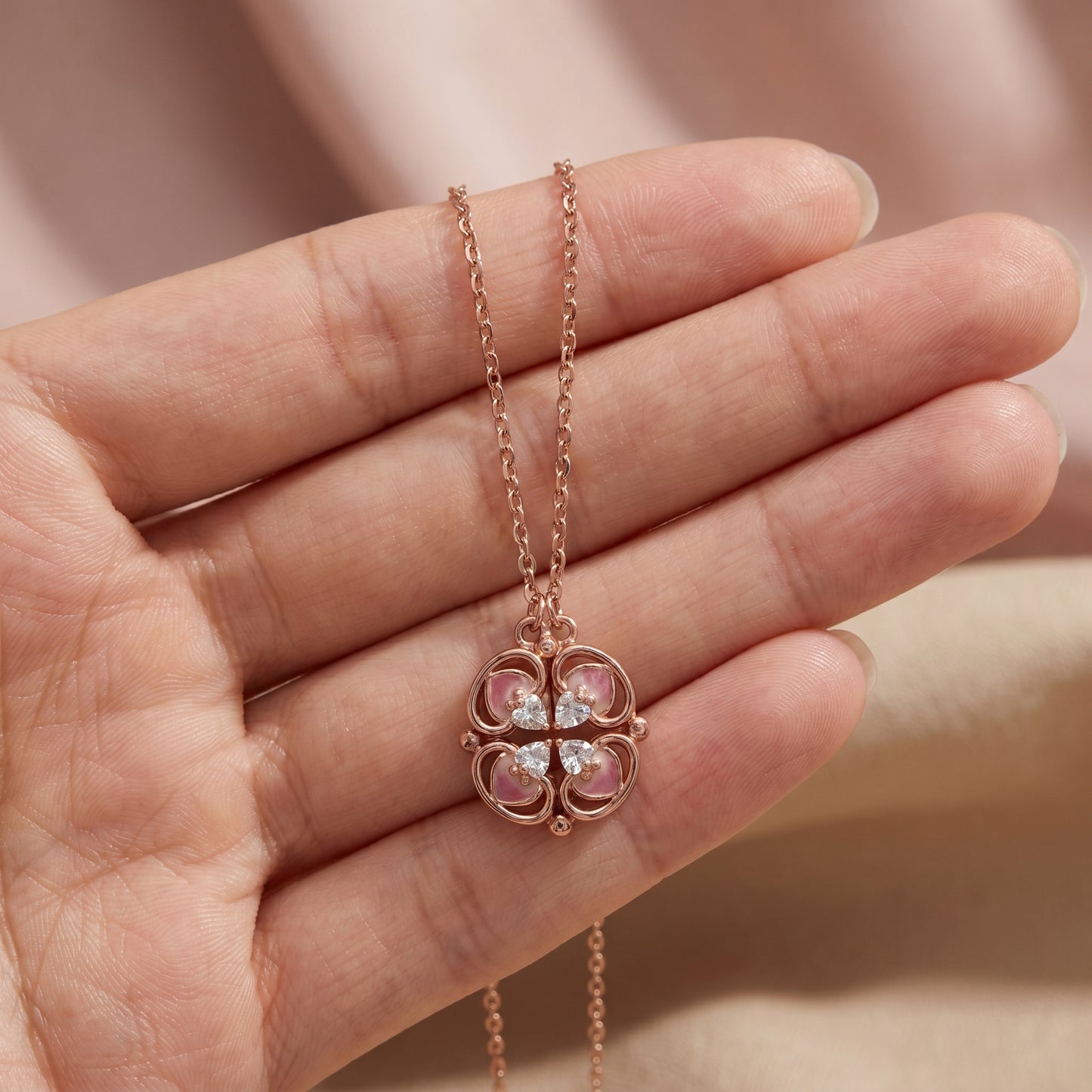 925 sterling silver rose gold lucky clover necklace shown on hand for size