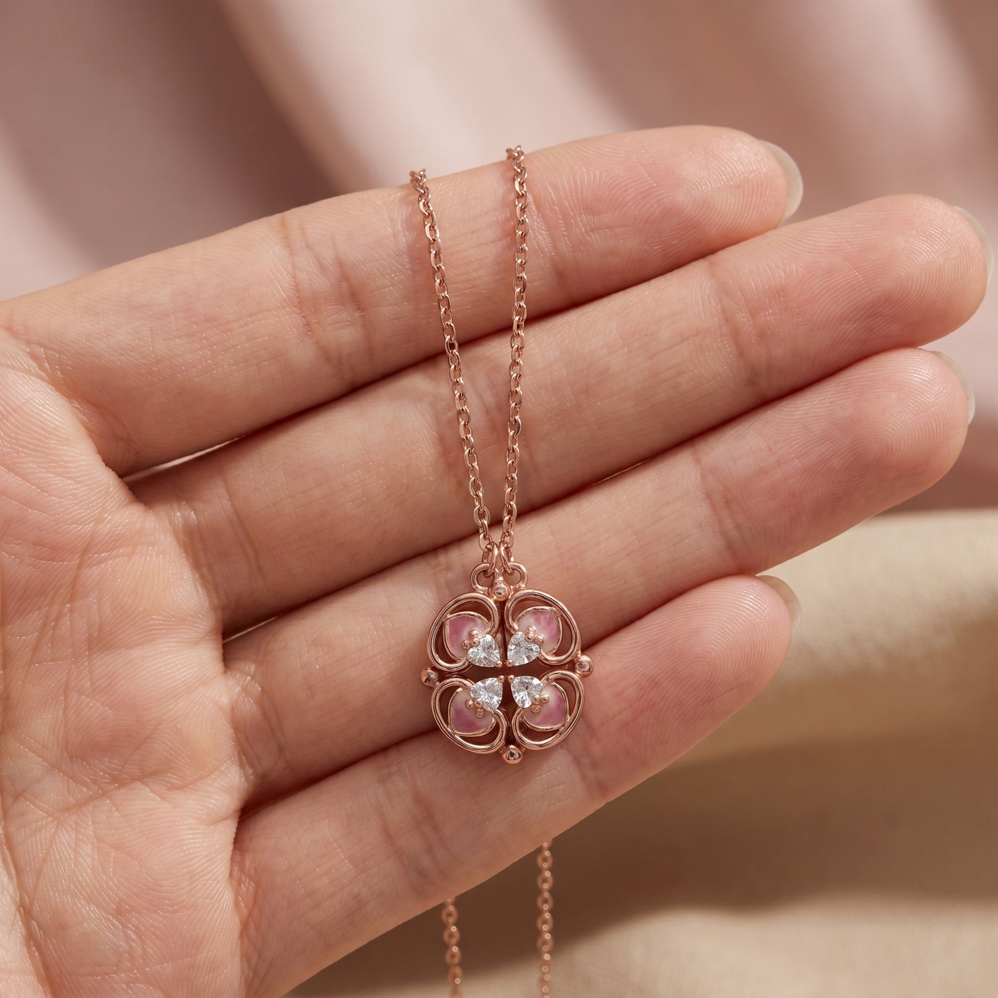 925 sterling silver rose gold lucky clover necklace shown on hand for size