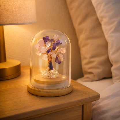 Crystal tree for love and compassion displayed on bedside table with warm light, meaningful home decor gift