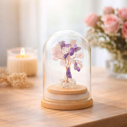 Crystal tree for love and compassion displayed on wooden table in natural light, calming home decor