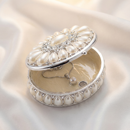 Open Elegant Pearl Oval Jewellery Box with smooth ivory interior for storing rings and small jewellery