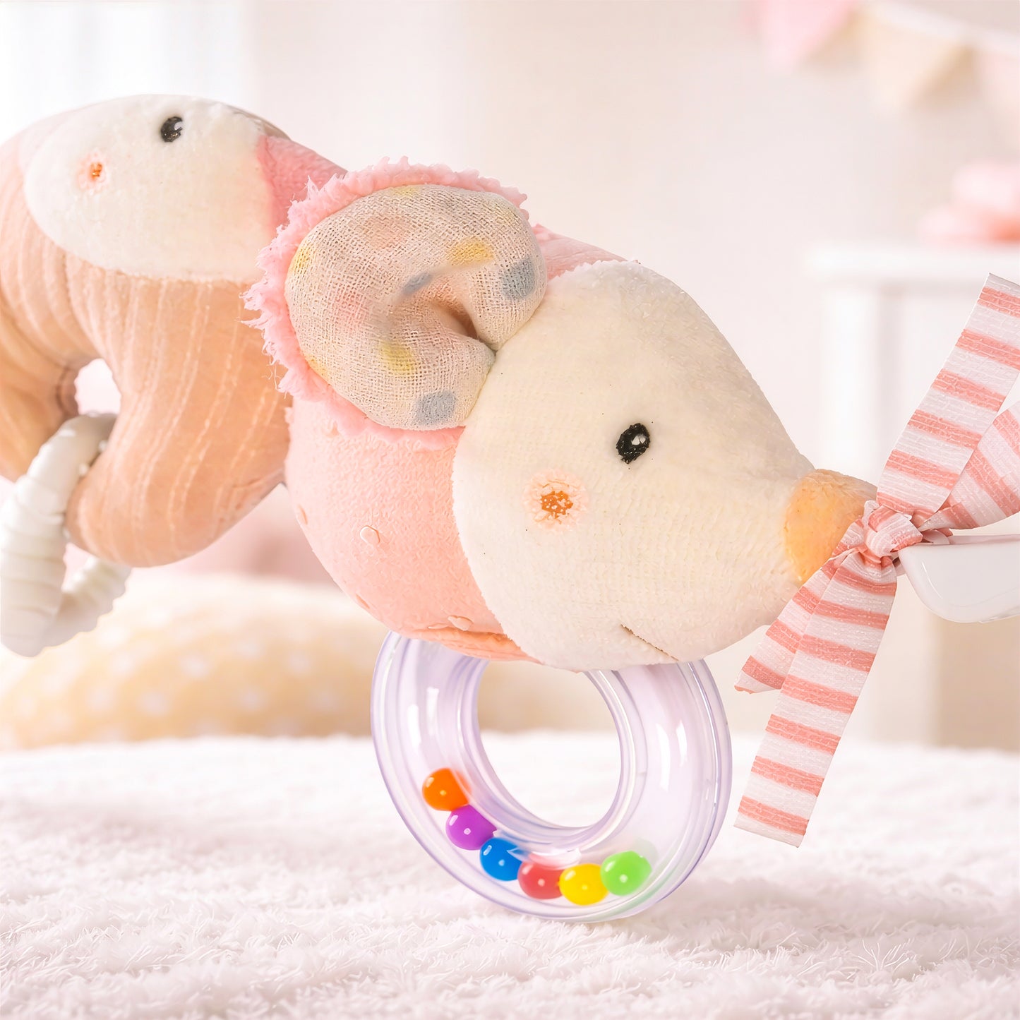Close up of fairy pram chain toy rattle ring and soft plush texture