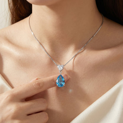Forever Love 925 sterling silver ocean heart blue necklace worn on model, romantic blue cubic zirconia pendant gift for her Australia