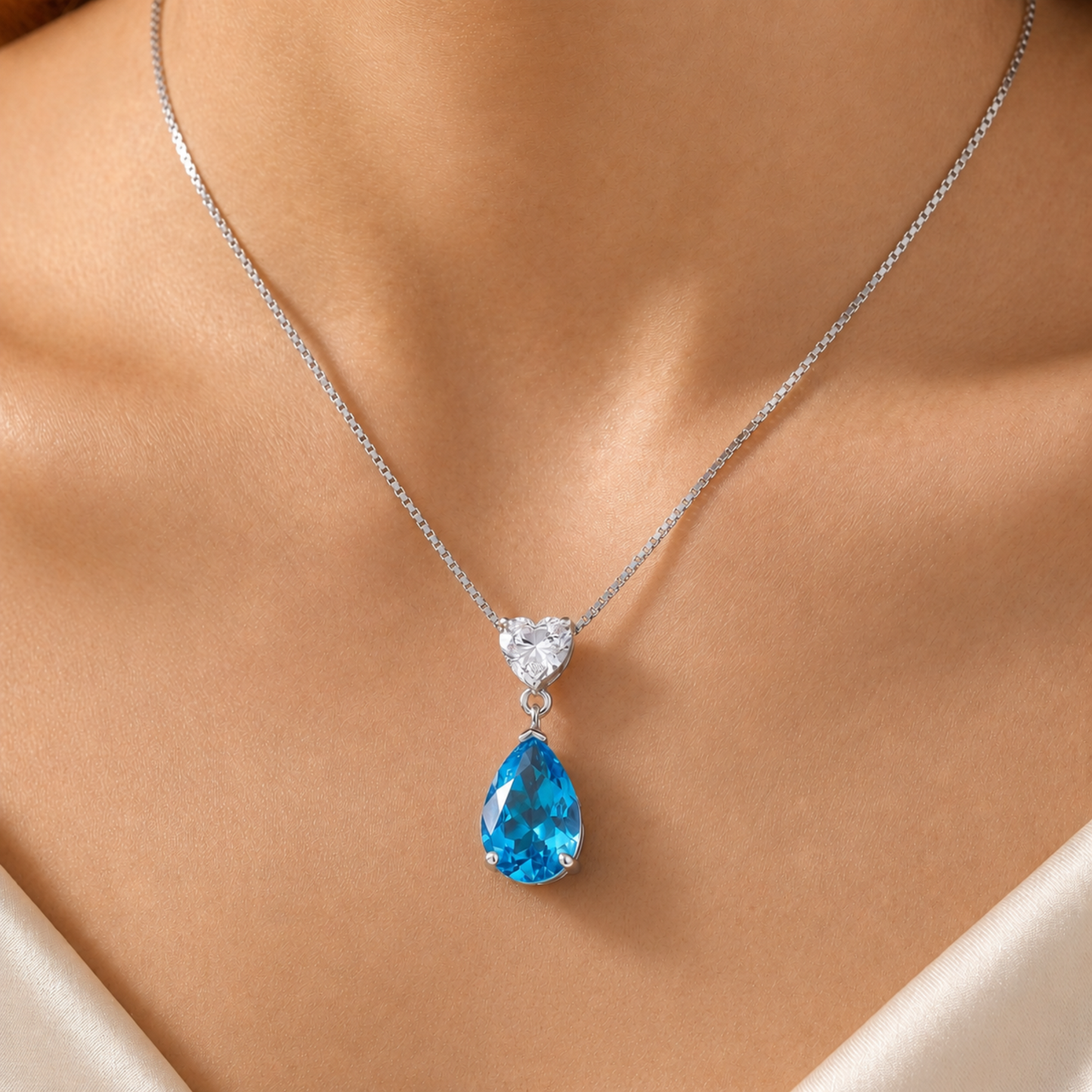 Forever Love 925 sterling silver ocean heart blue necklace worn on model, romantic blue cubic zirconia pendant gift for her Australia