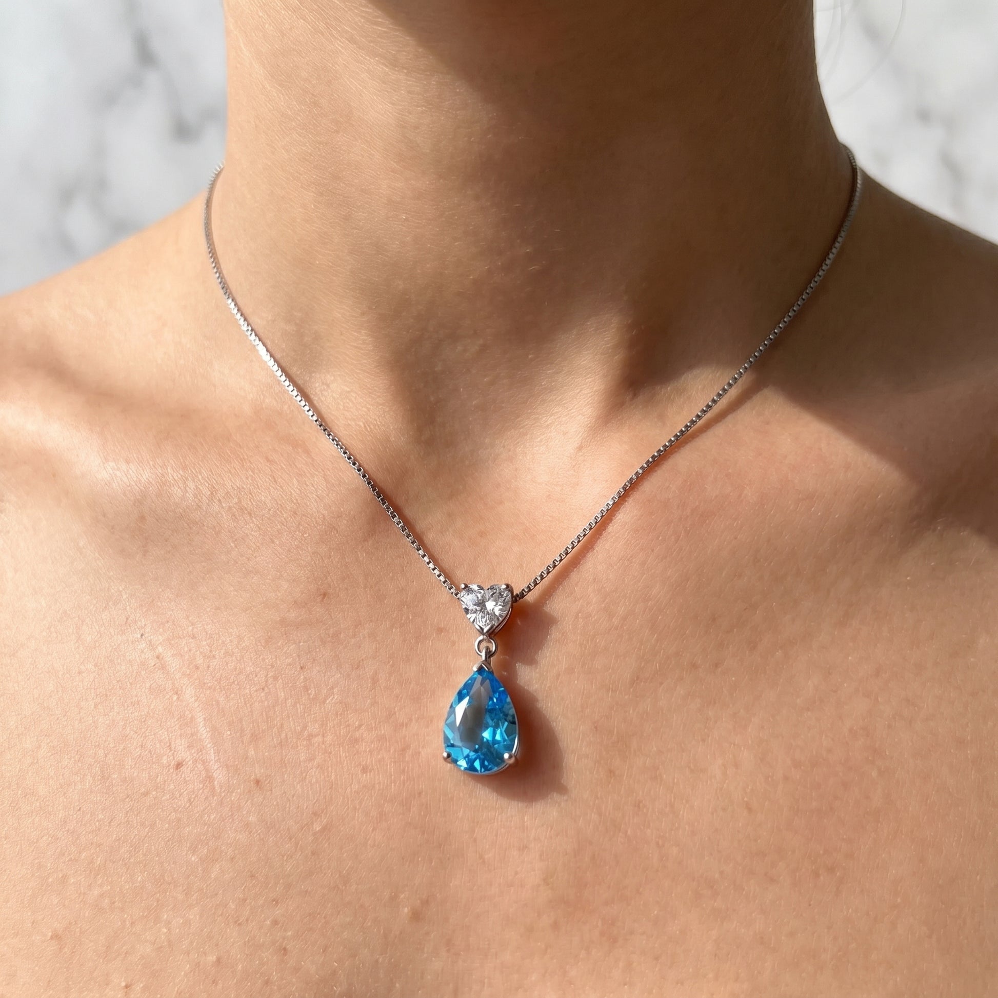 Forever Love 925 sterling silver ocean heart blue necklace worn on model, romantic blue cubic zirconia pendant anniversary gift for her Australia