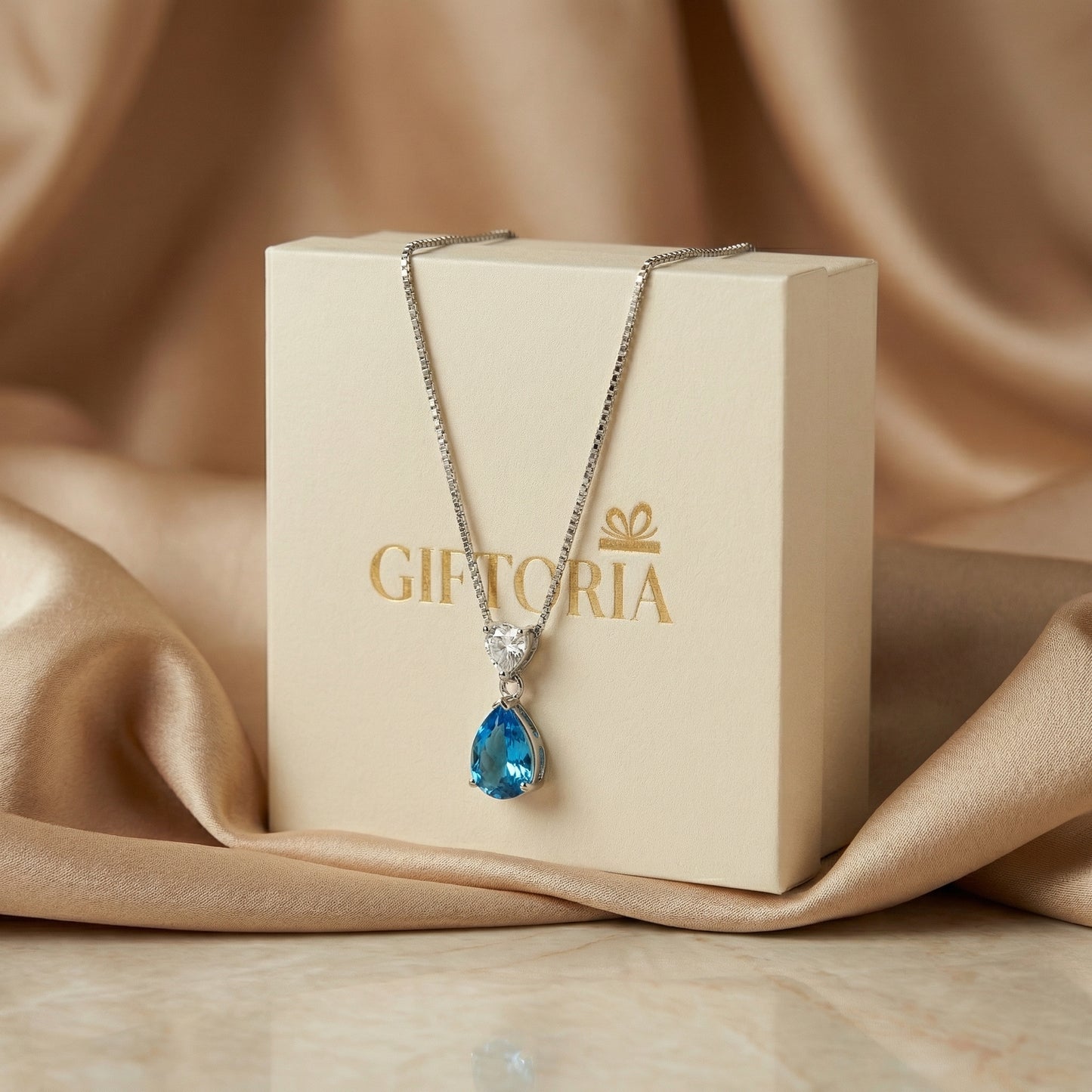 Gift ready ocean heart blue necklace displayed with Giftoria gift box, elegant romantic jewellery gift for her Australia