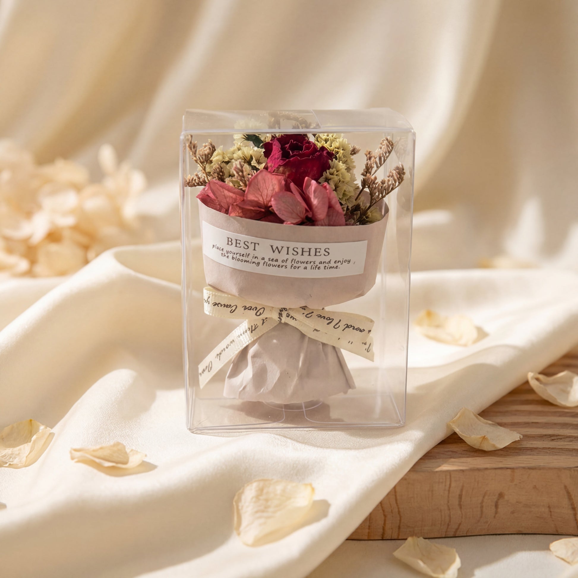 Red rose dried flower bouquet box on cream fabric, romantic ready-to-gift floral keepsake for her