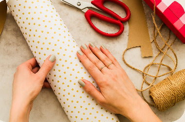 Hand gift wrapping service by Giftoria Australia stylists